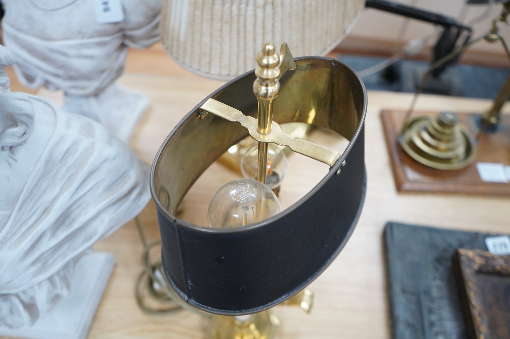 Two early 20th century French brass desk lamps, tallest 45cm